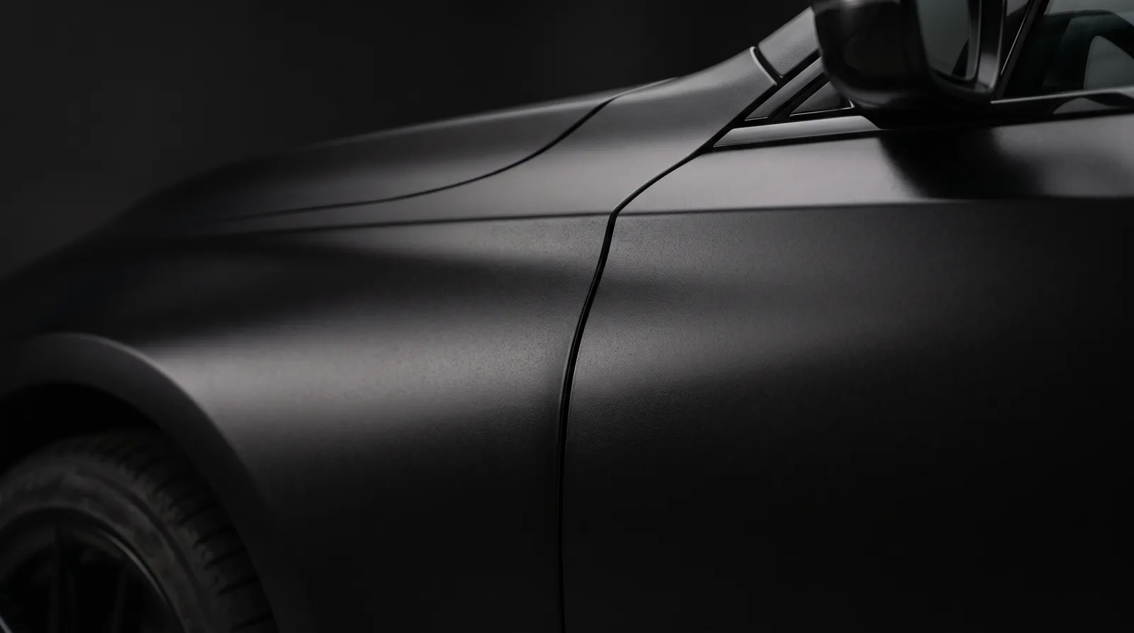 Close-up of a Flat Black car paint finish