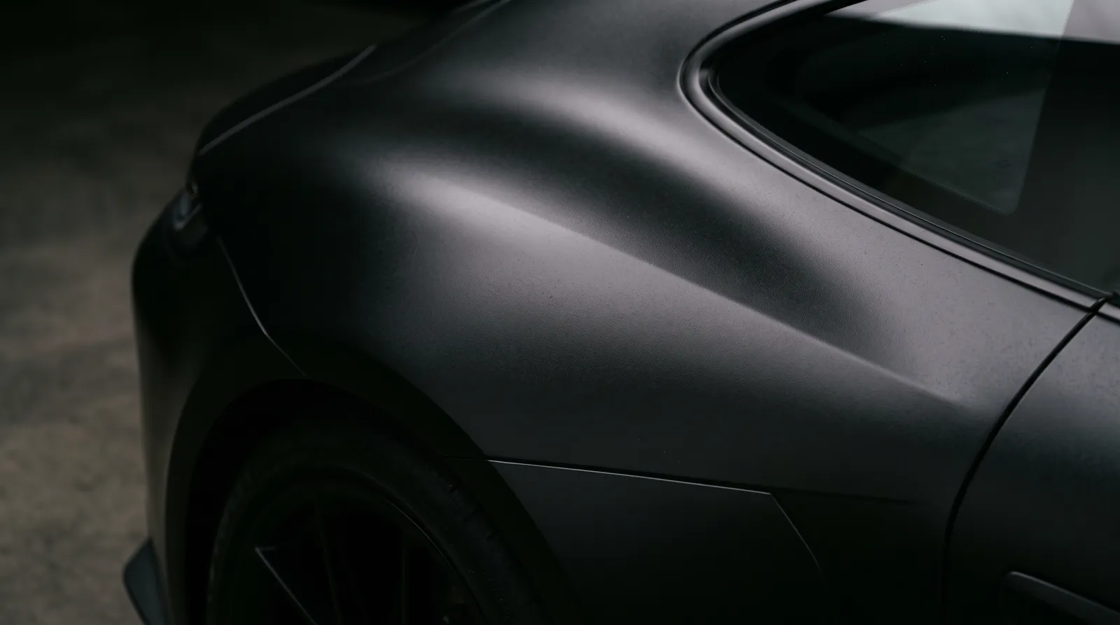 Close-up of a Matte Black car paint finish