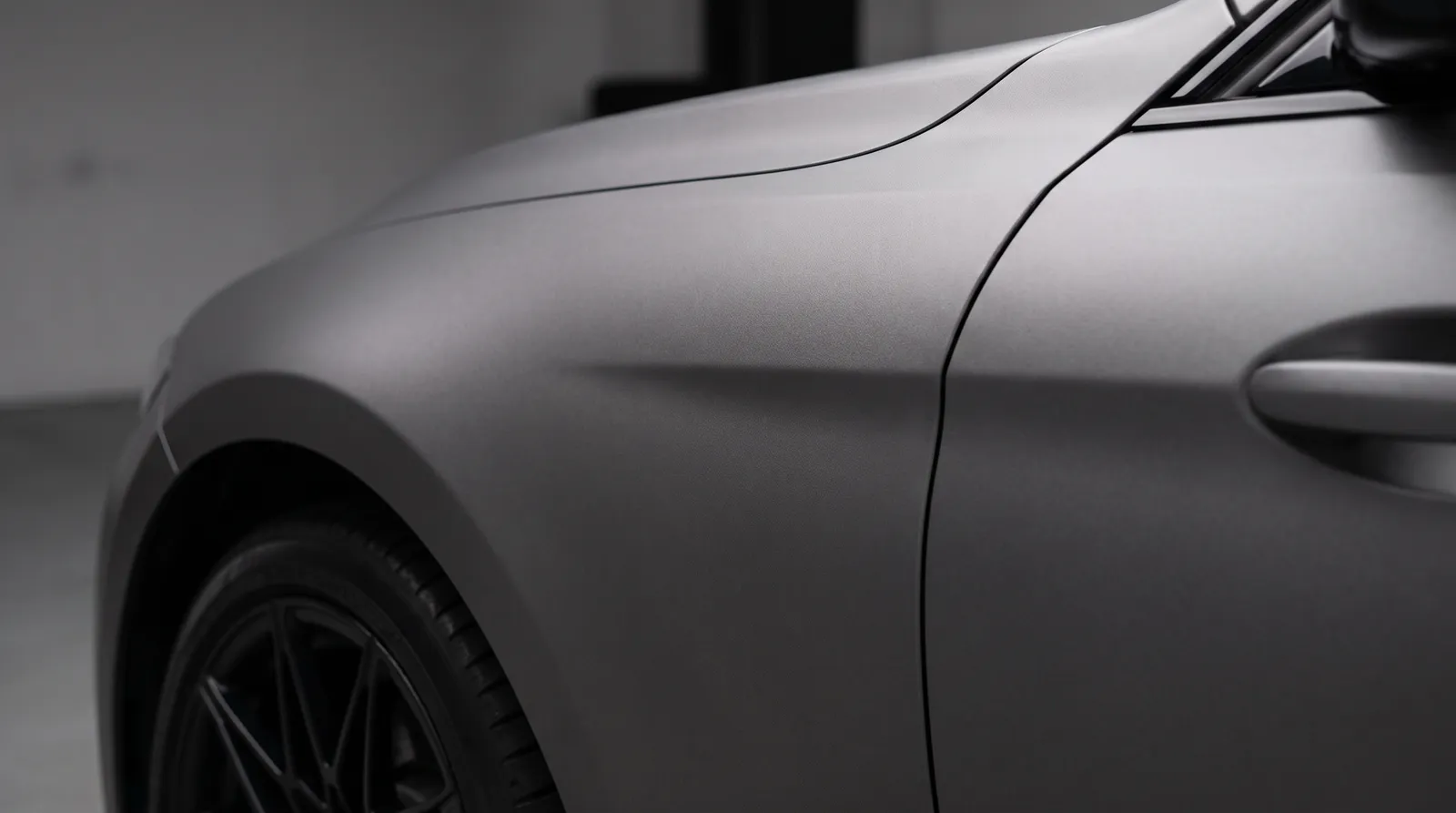 Close-up of a Matte Gray car paint finish